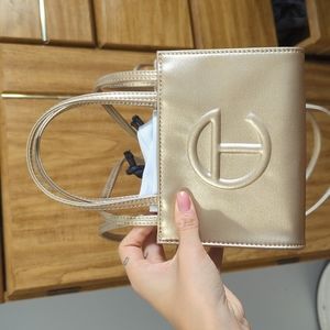 NWOT small gold Telfar shopping tote